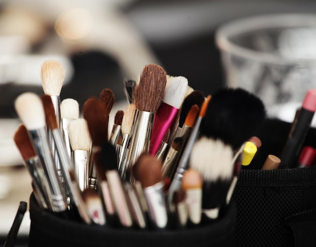 Closeup of makeup tools in their holder