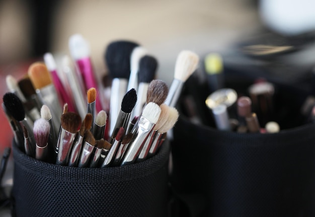 Closeup of makeup tools in their holder