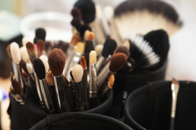 Closeup of makeup tools in their holder