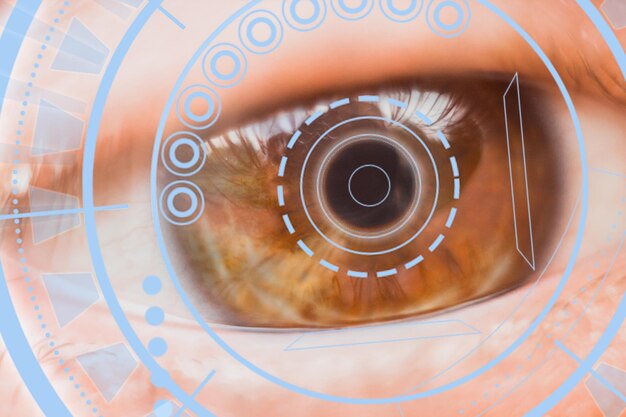 Photo closeup of a male eye with visual effects the concept of a sensor implanted in the human eye business computer cyberspace