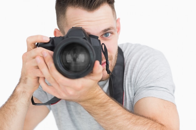 Closeup of male photographer with photographic camera