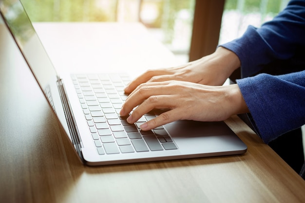 Photo closeup man working remotely at home