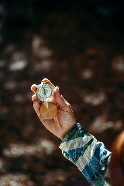 Closeup of a man39s hands holding a compass