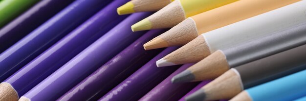 Closeup of many multicolored sharp wooden pencils