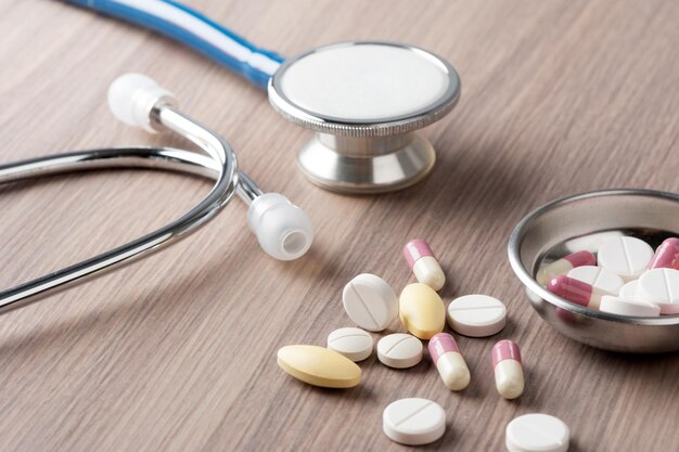 Closeup many pills on the desk, healthcare and medical concept