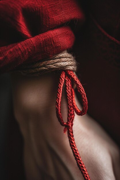 a closeup of a Martisor tied to a wrist