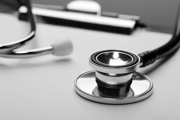 Closeup of medical stethoscope on clipboard