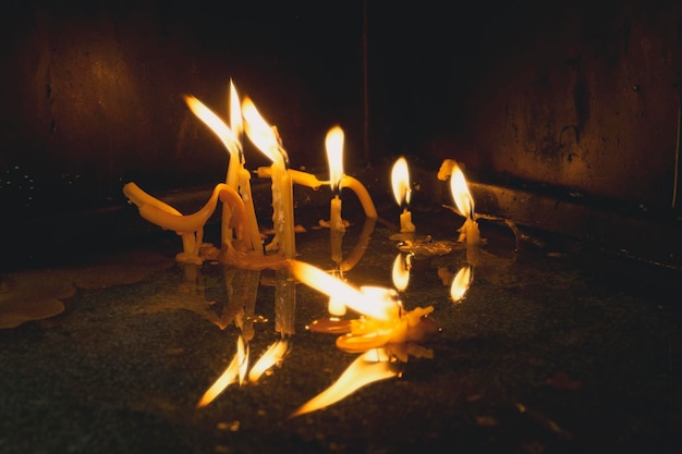 Closeup of the melting candles in the church