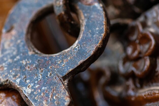 A closeup of a Metal element of a lock on an old door