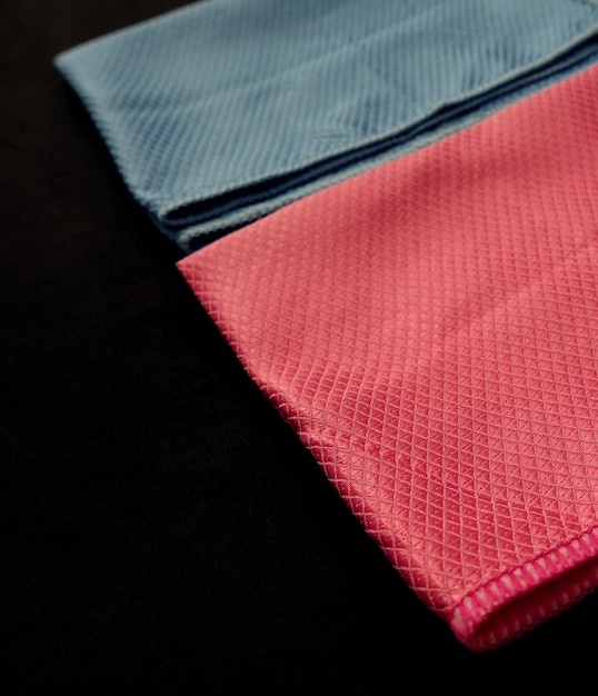 Closeup microfiber cleaning clothmicrofiber cleaning cloth in blue and pink colors