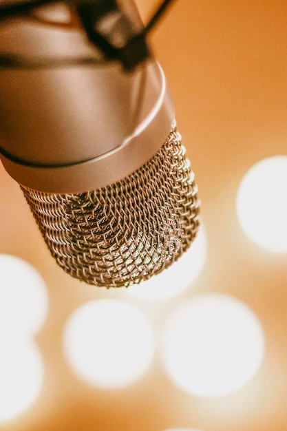 Closeup of a microphone with background bokeh