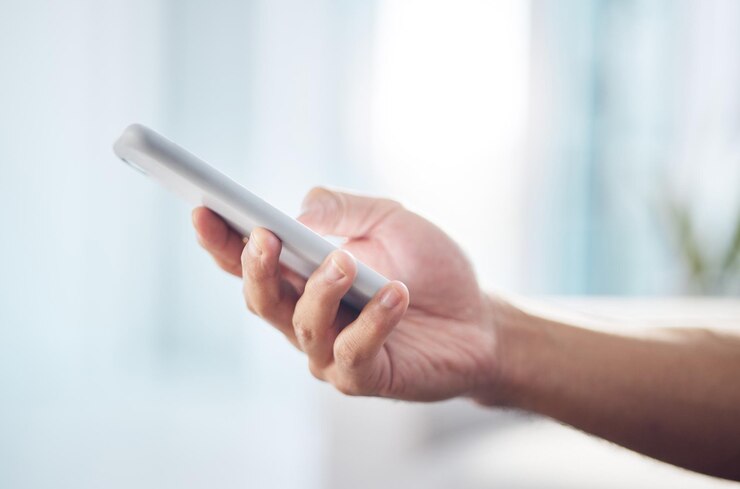 Photo closeup mockup and hand with smartphone typing and connection with communication social media and texting zoom hands and cellphone for online reading search internet and information on website