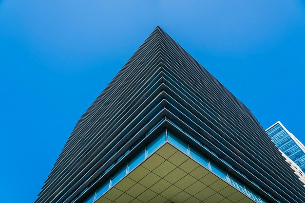 Closeup of a modern business city building looking up