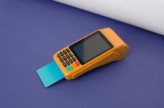 Closeup of a modern yellow contactless payment device for credit cards perfect for fast and secure transactions technology efficient and reliable solution for credit card transactions