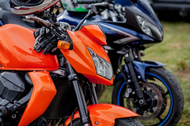 Closeup motorcycles parked on the motorcycles parking lot