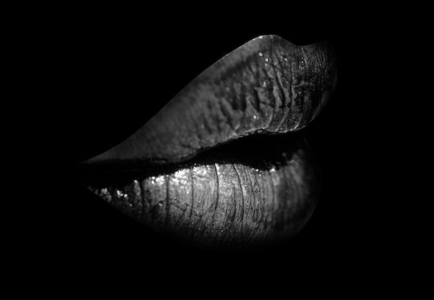 Closeup mouth with sexy lips Isolated on black background