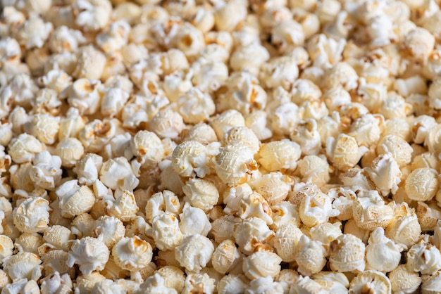 Photo closeup mushroom popcorn varieties on a lot of background