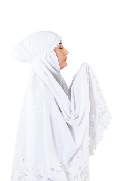 Closeup of muslim woman praying on white background