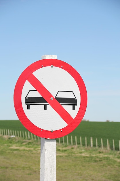 Photo closeup of a no passing traffic sign