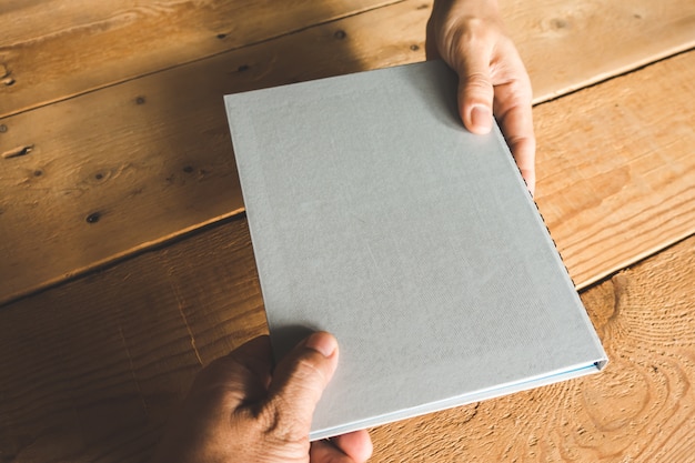 Closeup notebook on wooden table.