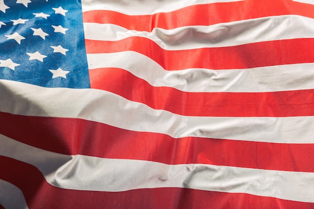 Фото Крупный план взъерошенного американского флага
