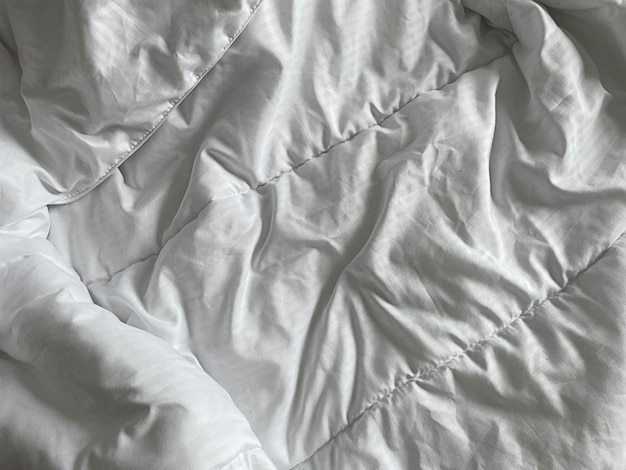 Фото Крупный план белой ткани текстуры фона шелковой текстуры