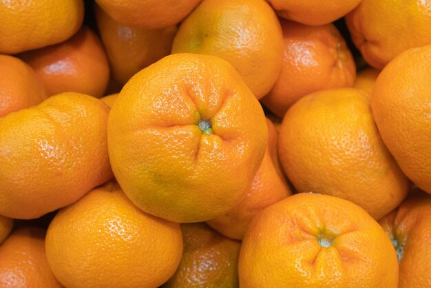Closeup of orange In the market, the concept of vitamin C and health