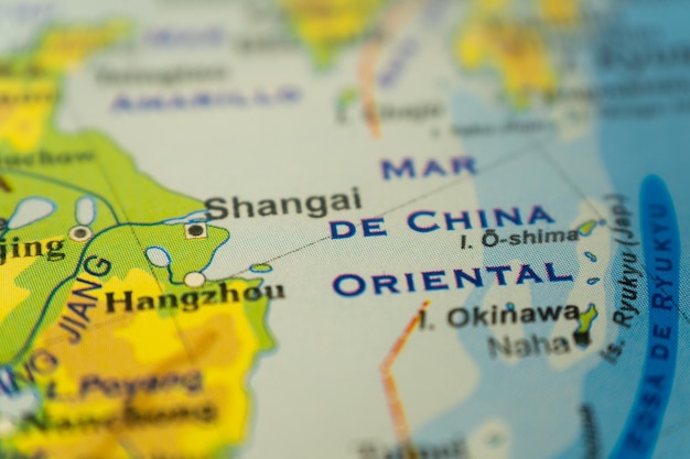 Closeup of the orographic map of shanghai and the china sea\
with references in spanish concept cartography travel tourism\
geography differential focus