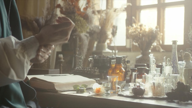 A closeup of a perfumer at his desk looking for a new fragrance premium photo