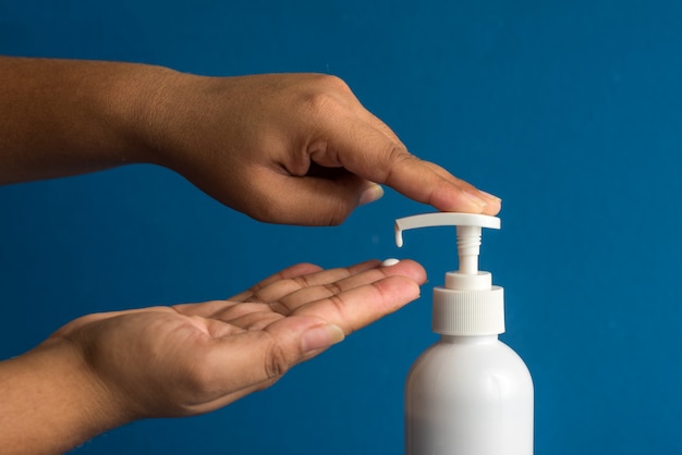 Closeup of person washing hands.