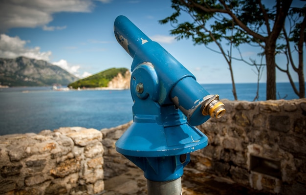 Closeup photo of coin operated telescope at old fortress