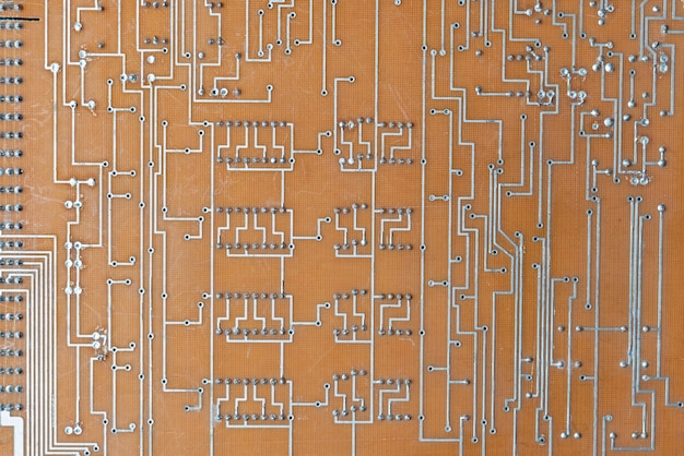 Closeup photo of computer circuit board background texture abstract