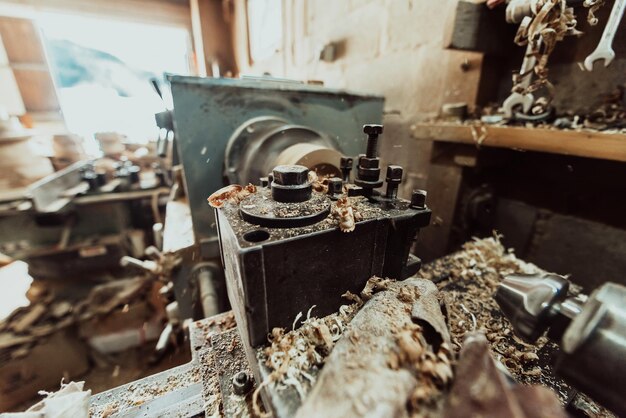 Closeup photo of a lathe working on wood Mechanical processing of wood