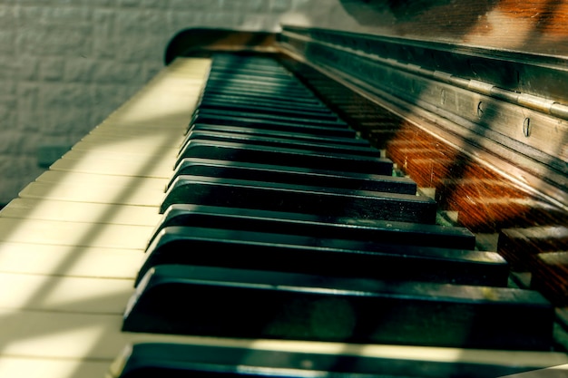 Closeup photo of piano keyboard with selective focus