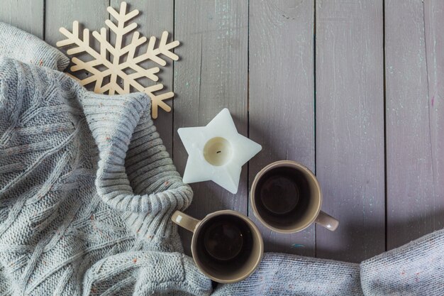 Closeup photo of warm sweater with mug