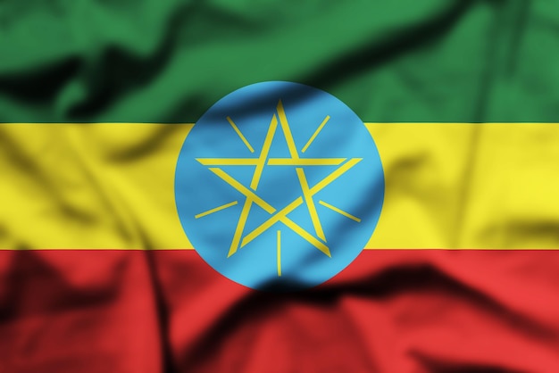 Closeup photo of the waving flag of the Ethiopia