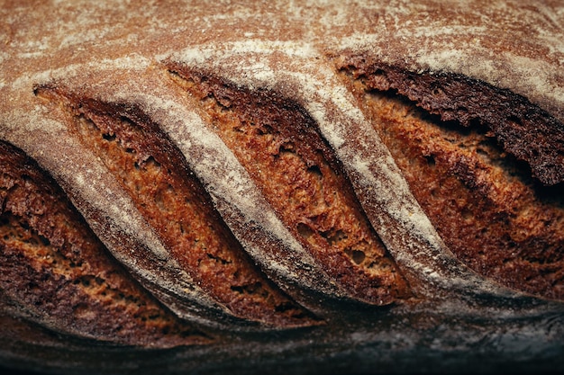 Closeup photo of a whole wheat loaf of bread.