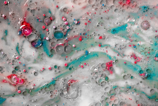 CloseUp Photograph of Bubbles on Colorful Liquid Photo