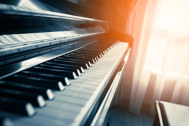 closeup piano key with light from window