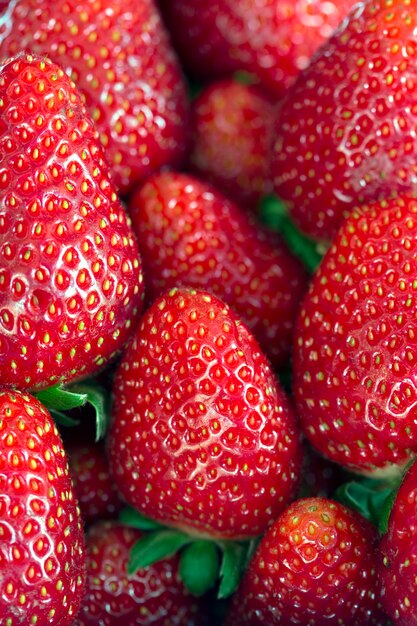 Closeup of pile of ripe strawberries