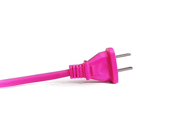 Photo closeup pink electric plug isolated on white background