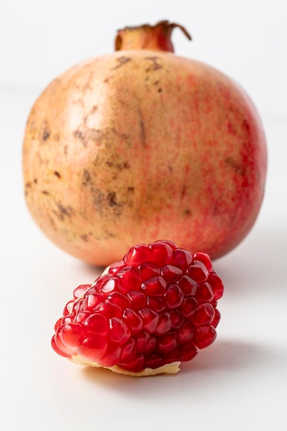 Closeup pomegranate on a white background