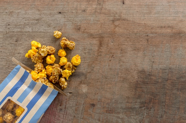 Closeup popcorn on wood table