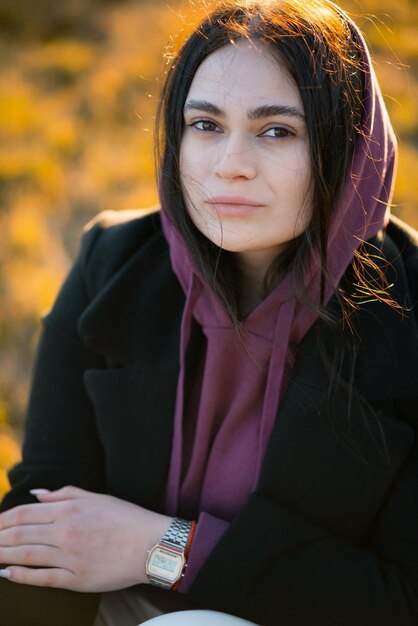 Closeup portrait of an attractive darkhaired girl