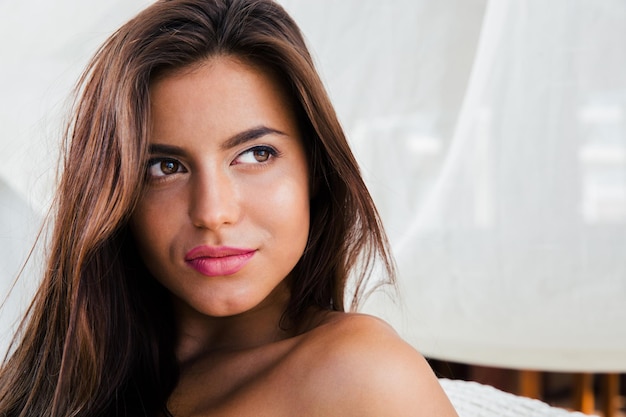 CLoseup portrait of a beautiful woman looking away