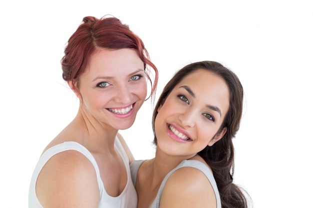 Closeup portrait of beautiful young female friends