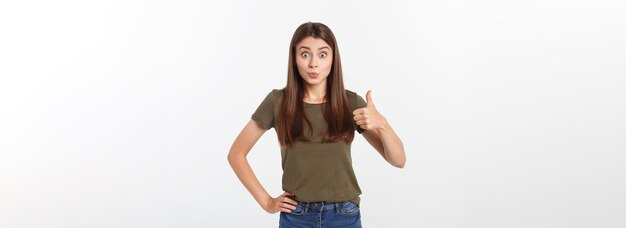 Closeup portrait of a beautiful young woman showing thumbs up sign isolate over white background