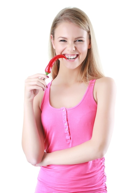 Closeup portrait of beautiful young woman with pepper