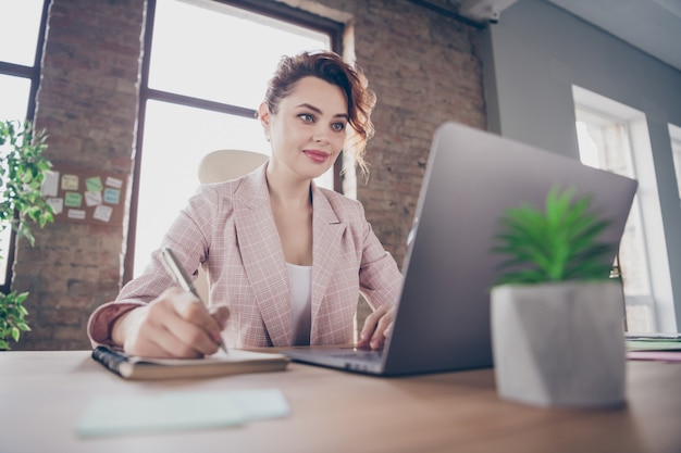 Closeup portrait of business lady write look screen laptop