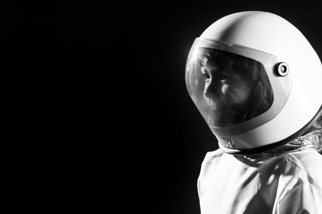 Closeup portrait of child boy playing astronaut little spaceman